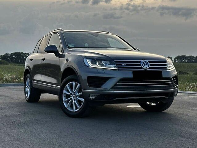 Серый Фольксваген Туарег, объемом двигателя 3 л и пробегом 139 тыс. км за 23200 $, фото 1 на Automoto.ua