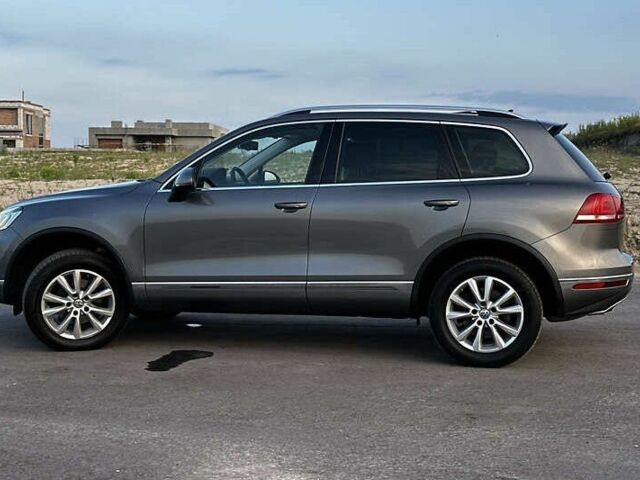 Серый Фольксваген Туарег, объемом двигателя 3 л и пробегом 139 тыс. км за 23200 $, фото 6 на Automoto.ua