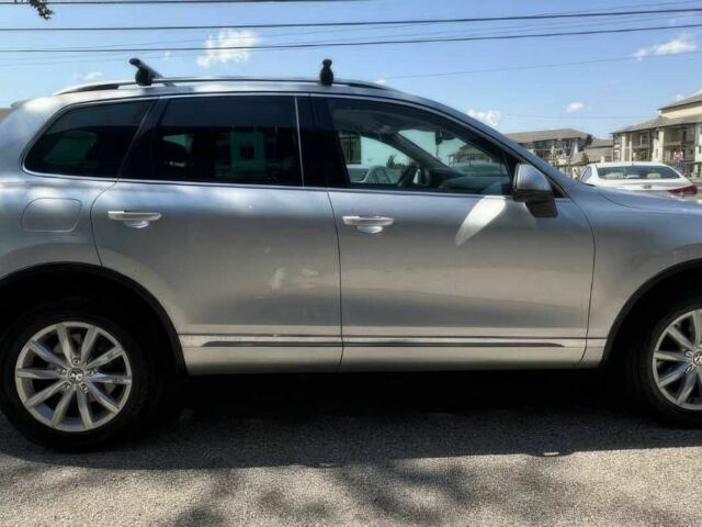 Серый Фольксваген Туарег, объемом двигателя 3.6 л и пробегом 79 тыс. км за 7700 $, фото 2 на Automoto.ua