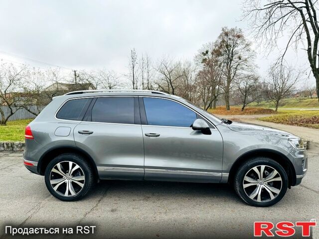 Серый Фольксваген Туарег, объемом двигателя 3 л и пробегом 109 тыс. км за 31500 $, фото 4 на Automoto.ua