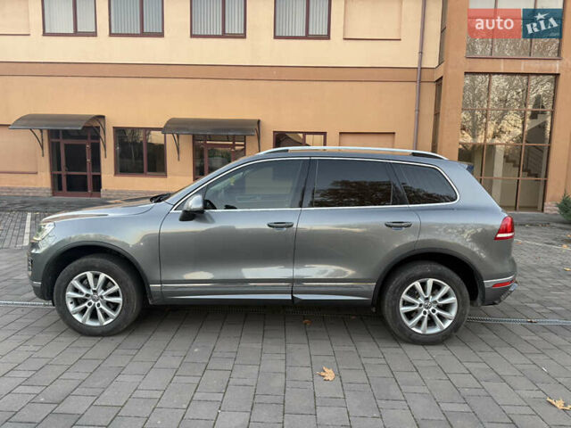 Серый Фольксваген Туарег, объемом двигателя 2.97 л и пробегом 139 тыс. км за 33900 $, фото 3 на Automoto.ua