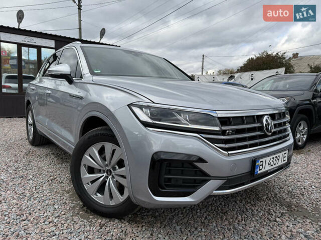 Серый Фольксваген Туарег, объемом двигателя 3 л и пробегом 109 тыс. км за 39700 $, фото 2 на Automoto.ua