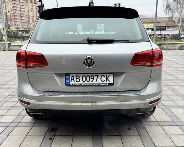 Серый Фольксваген Туарег, объемом двигателя 3 л и пробегом 228 тыс. км за 34900 $, фото 1 на Automoto.ua