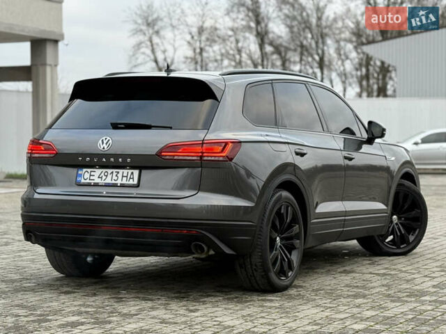 Сірий Фольксваген Туарег, об'ємом двигуна 3 л та пробігом 278 тис. км за 33700 $, фото 3 на Automoto.ua