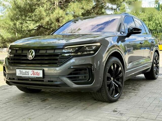 Сірий Фольксваген Туарег, об'ємом двигуна 3 л та пробігом 100 тис. км за 49500 $, фото 1 на Automoto.ua
