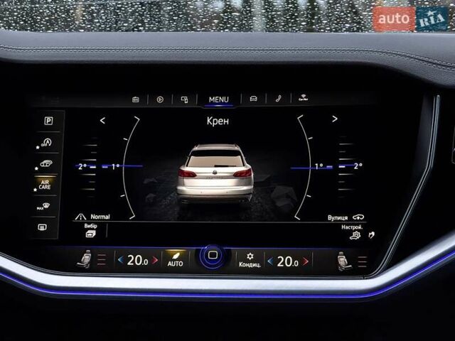 Серый Фольксваген Туарег, объемом двигателя 3 л и пробегом 135 тыс. км за 52999 $, фото 92 на Automoto.ua