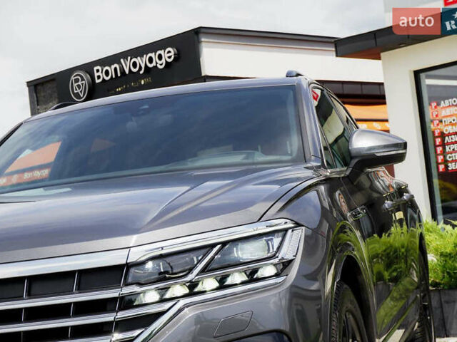 Серый Фольксваген Туарег, объемом двигателя 3 л и пробегом 160 тыс. км за 51500 $, фото 3 на Automoto.ua