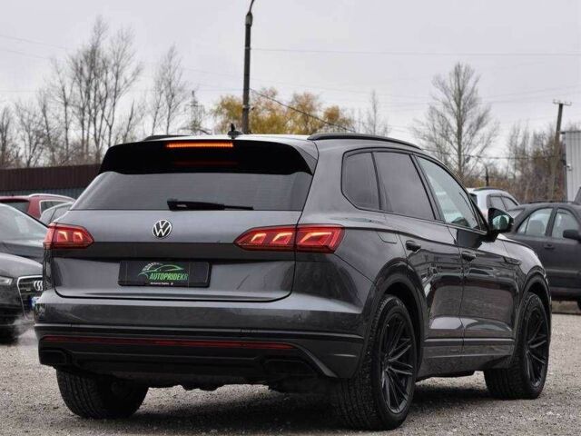 Сірий Фольксваген Туарег, об'ємом двигуна 3 л та пробігом 204 тис. км за 41999 $, фото 1 на Automoto.ua