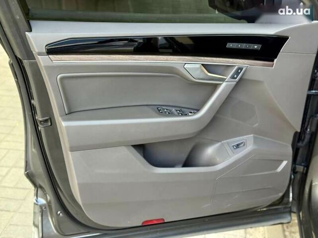 Сірий Фольксваген Туарег, об'ємом двигуна 3 л та пробігом 100 тис. км за 49500 $, фото 22 на Automoto.ua