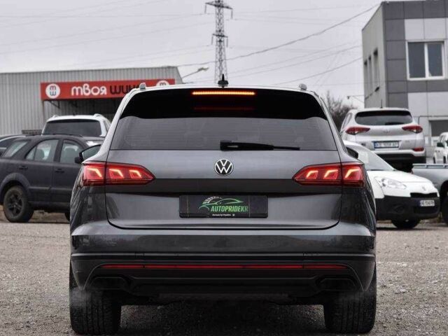 Сірий Фольксваген Туарег, об'ємом двигуна 3 л та пробігом 204 тис. км за 41999 $, фото 4 на Automoto.ua