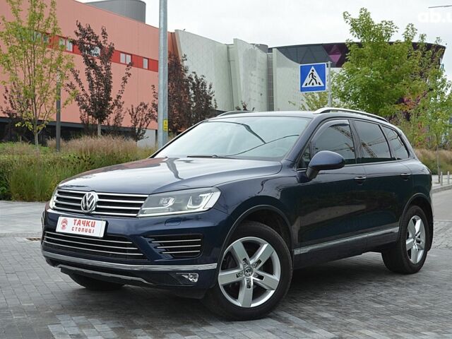 Синій Фольксваген Туарег, об'ємом двигуна 3 л та пробігом 144 тис. км за 23700 $, фото 1 на Automoto.ua