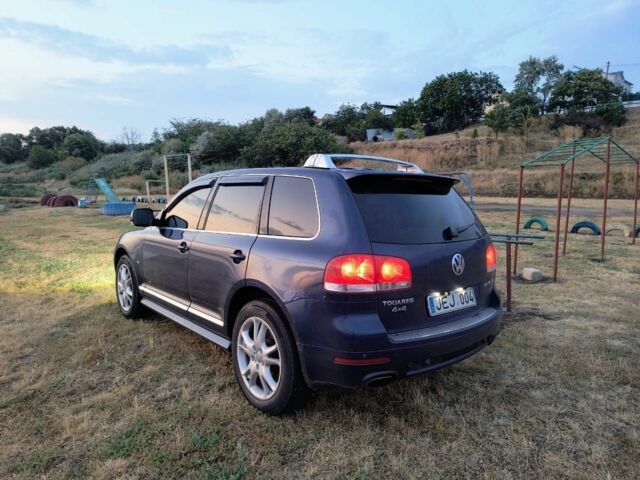 Синий Фольксваген Туарег, объемом двигателя 3 л и пробегом 300 тыс. км за 6200 $, фото 1 на Automoto.ua