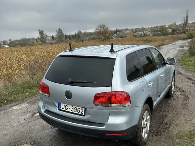 Синий Фольксваген Туарег, объемом двигателя 2.5 л и пробегом 351 тыс. км за 4000 $, фото 2 на Automoto.ua