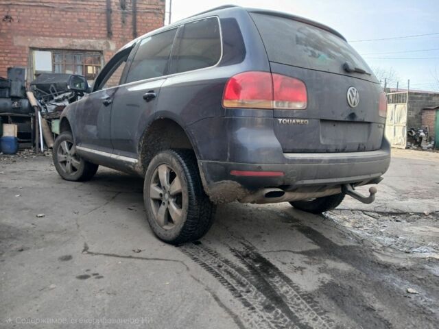 Синий Фольксваген Туарег, объемом двигателя 5 л и пробегом 400 тыс. км за 4662 $, фото 3 на Automoto.ua