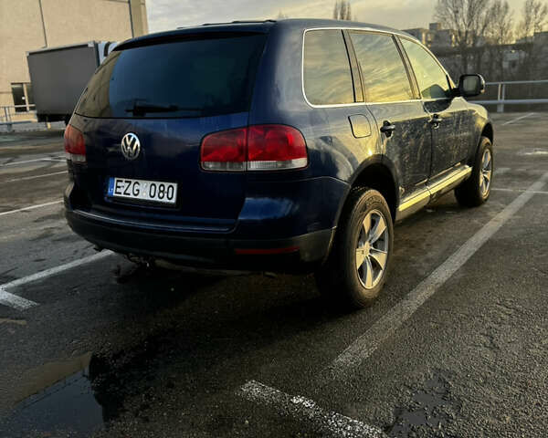 Синий Фольксваген Туарег, объемом двигателя 2.5 л и пробегом 472 тыс. км за 3799 $, фото 7 на Automoto.ua