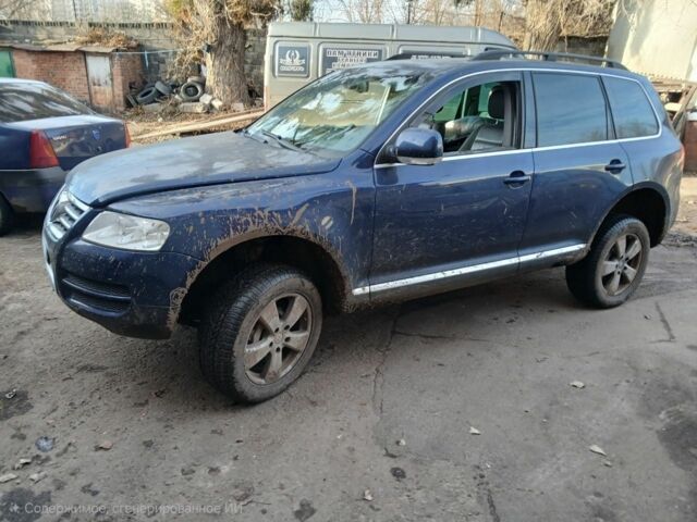 Синий Фольксваген Туарег, объемом двигателя 5 л и пробегом 400 тыс. км за 4662 $, фото 2 на Automoto.ua