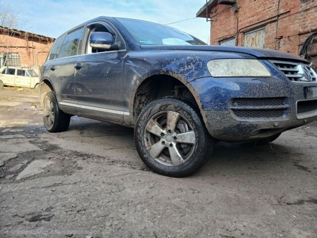 Синий Фольксваген Туарег, объемом двигателя 5 л и пробегом 400 тыс. км за 4662 $, фото 1 на Automoto.ua