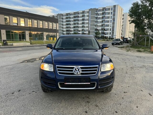 Синий Фольксваген Туарег, объемом двигателя 5 л и пробегом 192 тыс. км за 4400 $, фото 1 на Automoto.ua