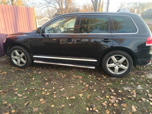 Синий Фольксваген Туарег, объемом двигателя 5 л и пробегом 210 тыс. км за 3783 $, фото 2 на Automoto.ua