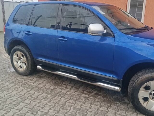 Синий Фольксваген Туарег, объемом двигателя 2.5 л и пробегом 306 тыс. км за 6800 $, фото 1 на Automoto.ua