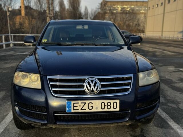 Синий Фольксваген Туарег, объемом двигателя 2.5 л и пробегом 372 тыс. км за 3799 $, фото 1 на Automoto.ua