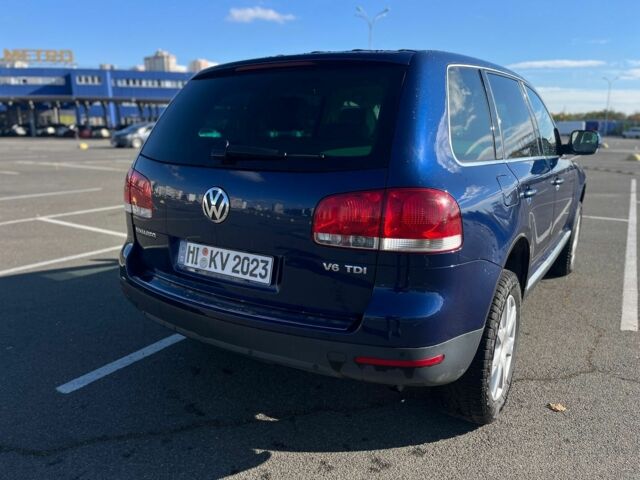 Синий Фольксваген Туарег, объемом двигателя 3 л и пробегом 367 тыс. км за 5800 $, фото 8 на Automoto.ua