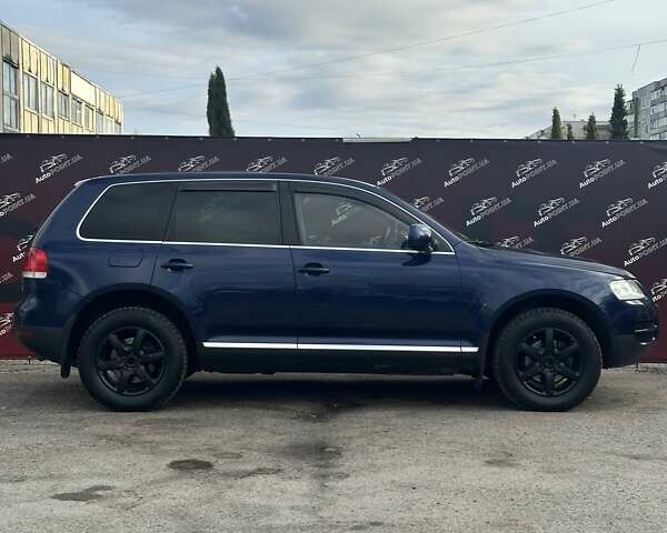 Синий Фольксваген Туарег, объемом двигателя 2.46 л и пробегом 264 тыс. км за 9700 $, фото 3 на Automoto.ua