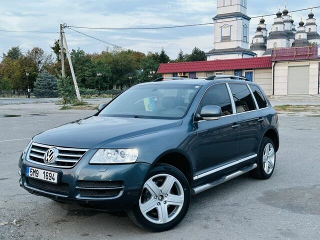 Синій Фольксваген Туарег, об'ємом двигуна 3 л та пробігом 200 тис. км за 4856 $, фото 1 на Automoto.ua