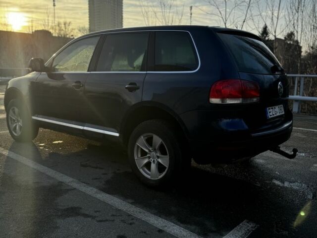 Синий Фольксваген Туарег, объемом двигателя 2.5 л и пробегом 372 тыс. км за 3799 $, фото 5 на Automoto.ua