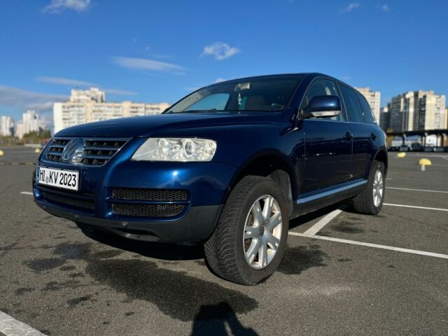 Синий Фольксваген Туарег, объемом двигателя 3 л и пробегом 367 тыс. км за 5800 $, фото 1 на Automoto.ua