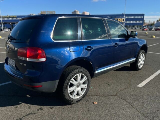 Синий Фольксваген Туарег, объемом двигателя 3 л и пробегом 367 тыс. км за 5800 $, фото 5 на Automoto.ua