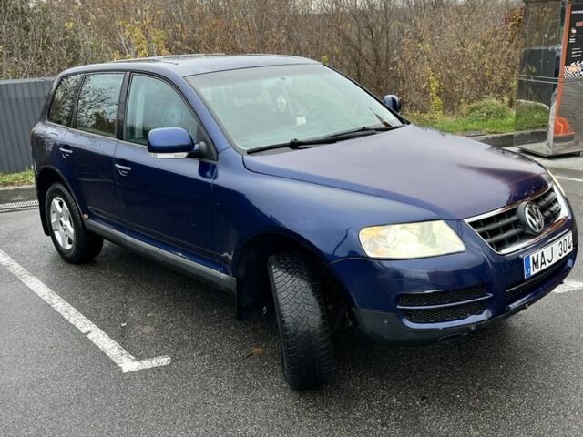 Синий Фольксваген Туарег, объемом двигателя 2.5 л и пробегом 300 тыс. км за 4600 $, фото 1 на Automoto.ua