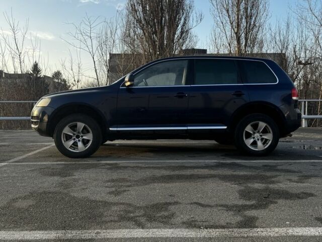 Синий Фольксваген Туарег, объемом двигателя 2.5 л и пробегом 372 тыс. км за 3799 $, фото 4 на Automoto.ua