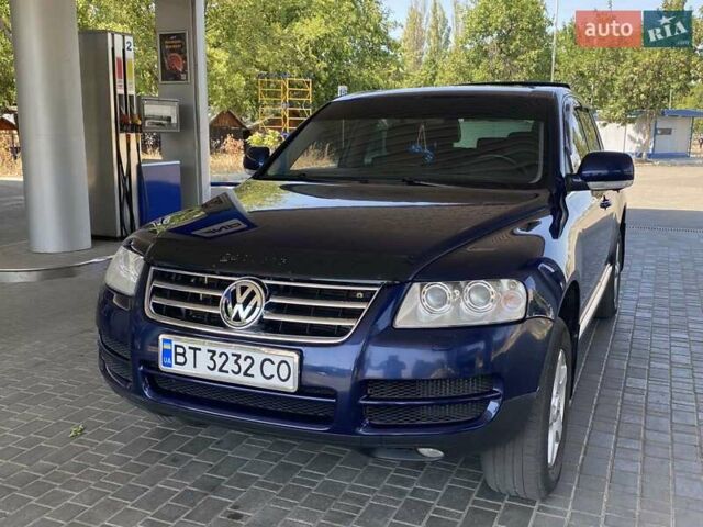 Синий Фольксваген Туарег, объемом двигателя 2.97 л и пробегом 284 тыс. км за 9000 $, фото 2 на Automoto.ua