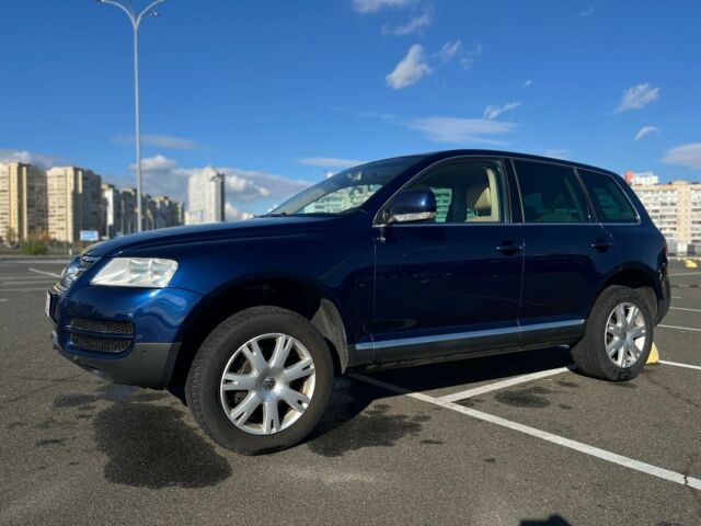 Синий Фольксваген Туарег, объемом двигателя 3 л и пробегом 367 тыс. км за 5800 $, фото 4 на Automoto.ua