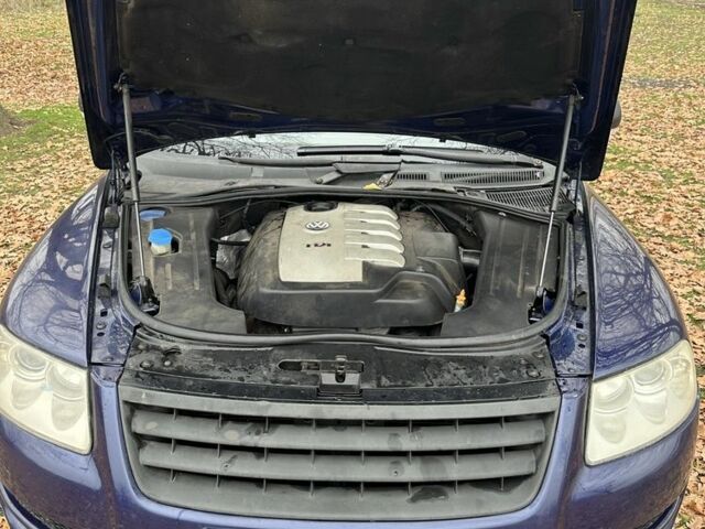 Синій Фольксваген Туарег, об'ємом двигуна 2.5 л та пробігом 321 тис. км за 3950 $, фото 4 на Automoto.ua