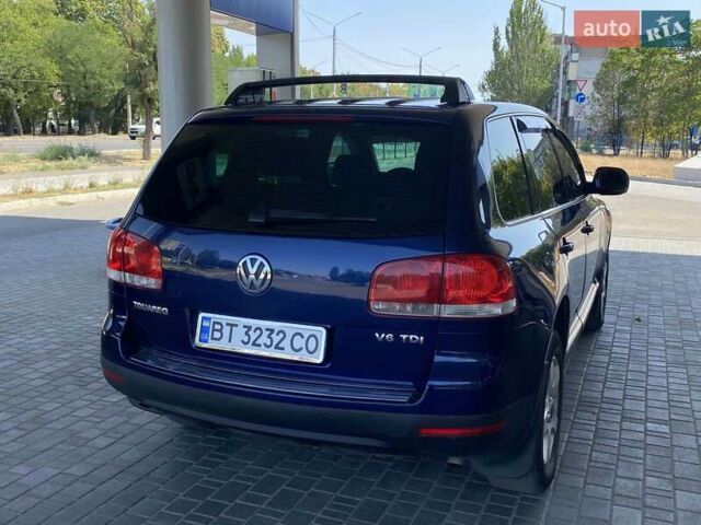 Синий Фольксваген Туарег, объемом двигателя 2.97 л и пробегом 284 тыс. км за 9000 $, фото 11 на Automoto.ua