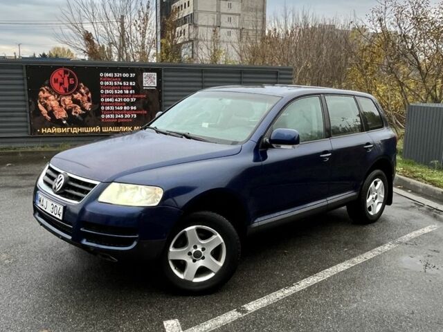 Синий Фольксваген Туарег, объемом двигателя 2.5 л и пробегом 300 тыс. км за 4600 $, фото 4 на Automoto.ua