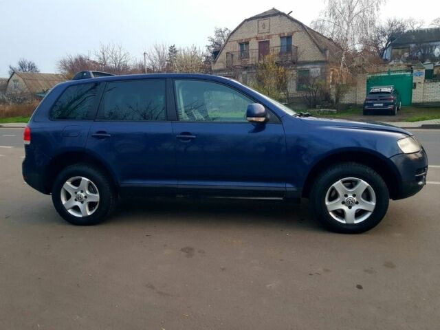 Синій Фольксваген Туарег, об'ємом двигуна 3 л та пробігом 300 тис. км за 9500 $, фото 3 на Automoto.ua