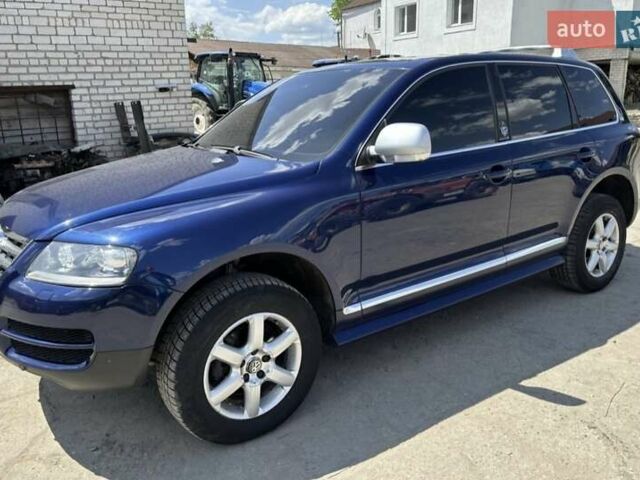 Синий Фольксваген Туарег, объемом двигателя 2.46 л и пробегом 291 тыс. км за 8000 $, фото 4 на Automoto.ua