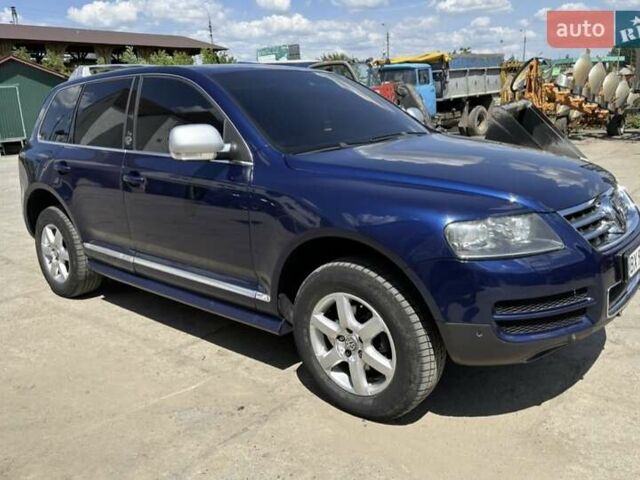 Синий Фольксваген Туарег, объемом двигателя 2.46 л и пробегом 291 тыс. км за 8000 $, фото 1 на Automoto.ua