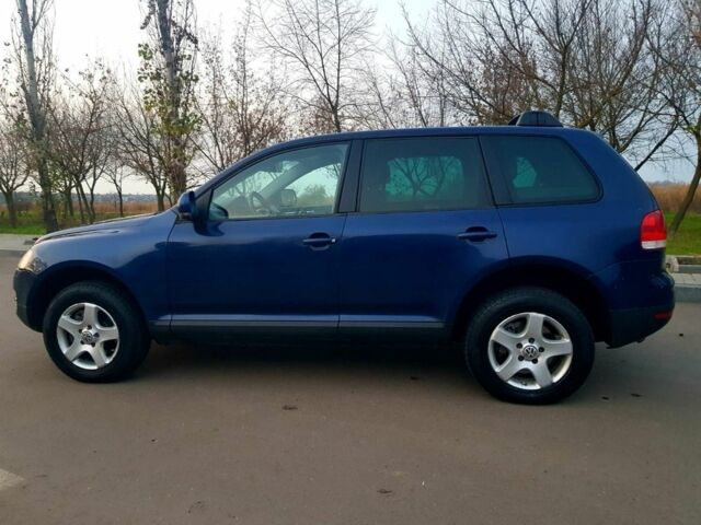 Синій Фольксваген Туарег, об'ємом двигуна 3 л та пробігом 300 тис. км за 9500 $, фото 5 на Automoto.ua