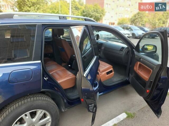 Синій Фольксваген Туарег, об'ємом двигуна 3 л та пробігом 347 тис. км за 10000 $, фото 8 на Automoto.ua