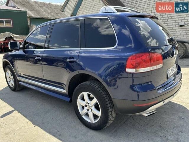 Синий Фольксваген Туарег, объемом двигателя 2.46 л и пробегом 291 тыс. км за 8000 $, фото 2 на Automoto.ua