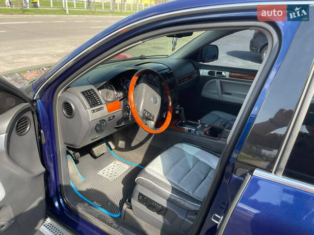 Синий Фольксваген Туарег, объемом двигателя 2.97 л и пробегом 361 тыс. км за 10500 $, фото 2 на Automoto.ua