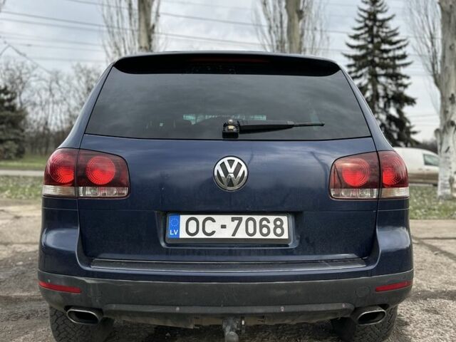 Синий Фольксваген Туарег, объемом двигателя 3 л и пробегом 350 тыс. км за 6200 $, фото 4 на Automoto.ua