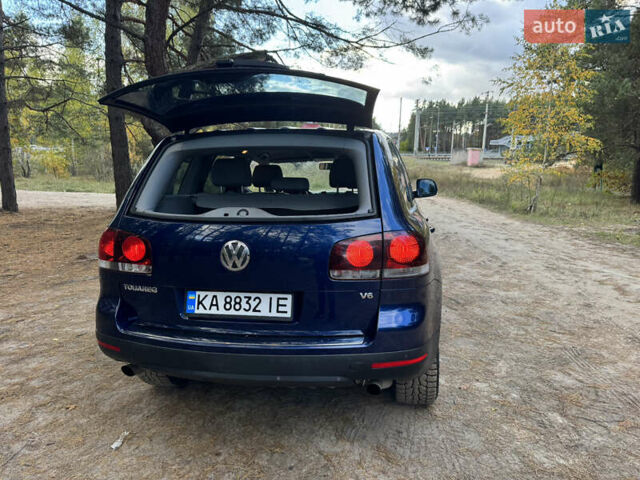 Синий Фольксваген Туарег, объемом двигателя 3.6 л и пробегом 353 тыс. км за 11000 $, фото 19 на Automoto.ua