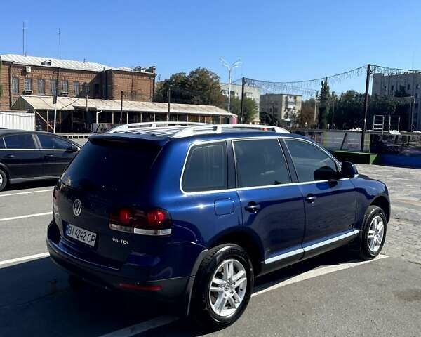 Синий Фольксваген Туарег, объемом двигателя 2.97 л и пробегом 246 тыс. км за 13000 $, фото 7 на Automoto.ua