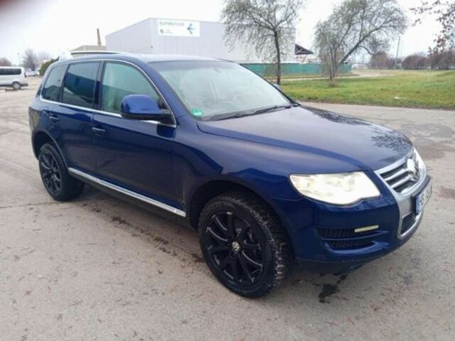 Синій Фольксваген Туарег, об'ємом двигуна 3 л та пробігом 300 тис. км за 6200 $, фото 2 на Automoto.ua