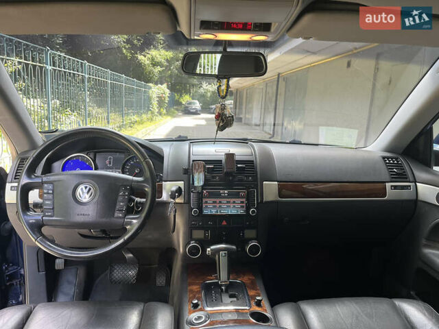 Синий Фольксваген Туарег, объемом двигателя 3 л и пробегом 386 тыс. км за 12300 $, фото 11 на Automoto.ua